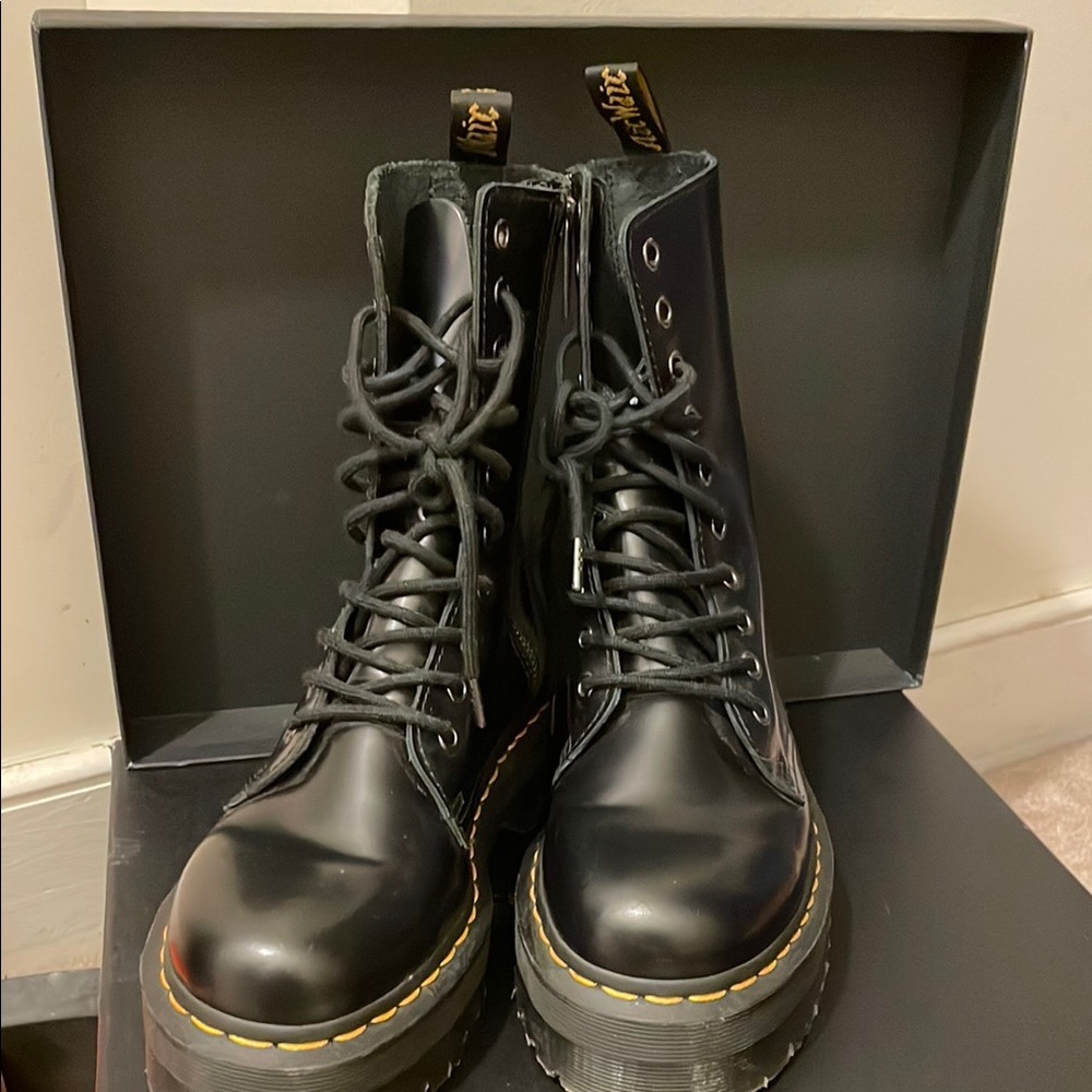 Dr. Martens Black Combat Boots with High-Top Design and Durable Sole